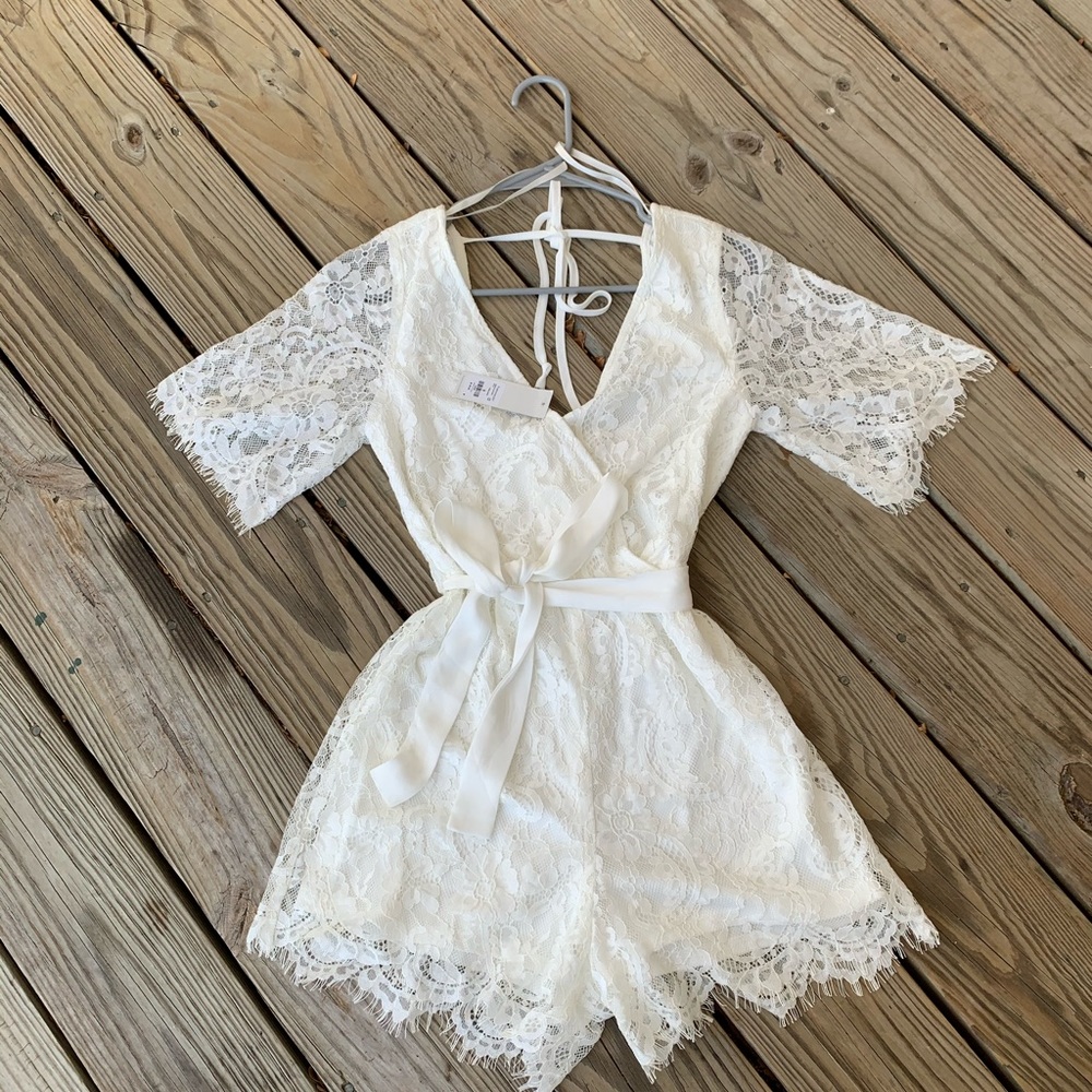 Francesca’s white lace romper